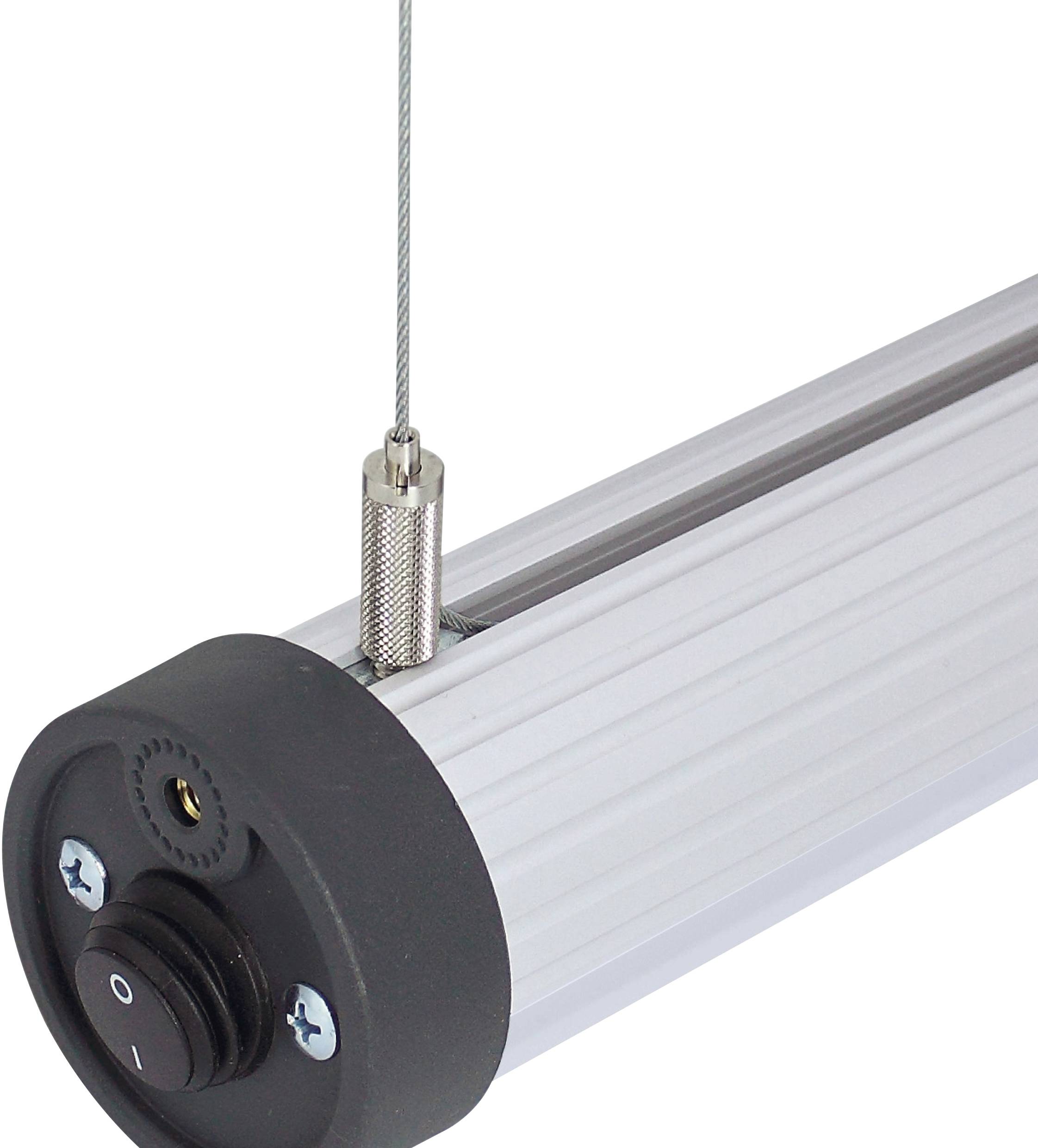 Ein silbernes, zylindrisches Gerät mit Befestigungskabel oben und Schalter an der Seite.