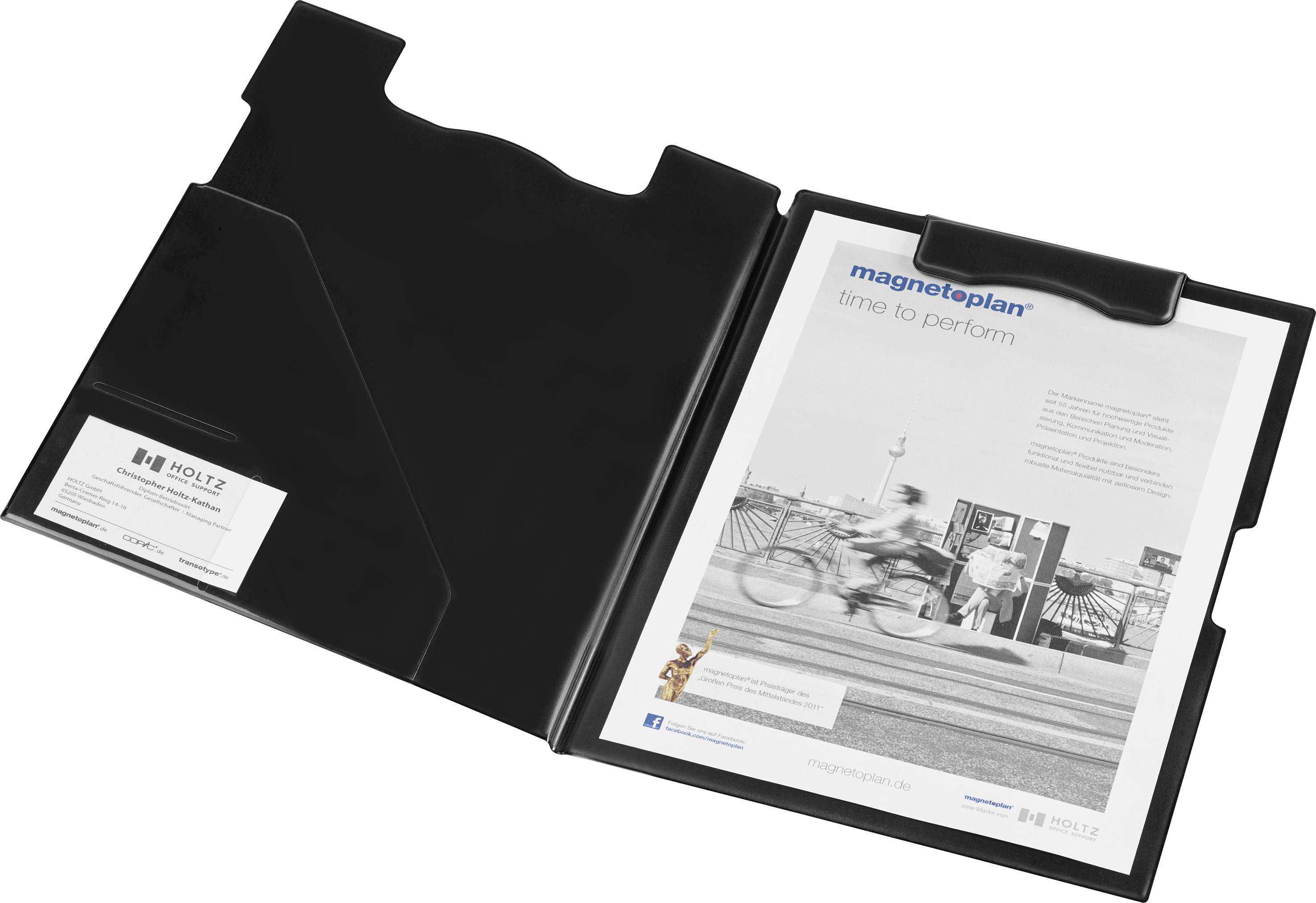 Schwarze Mappe mit einer Faltentasche links und einem Clip rechts. Enthält Broschüre mit Fahrradmotiv und den Text 'magnetoplan'.