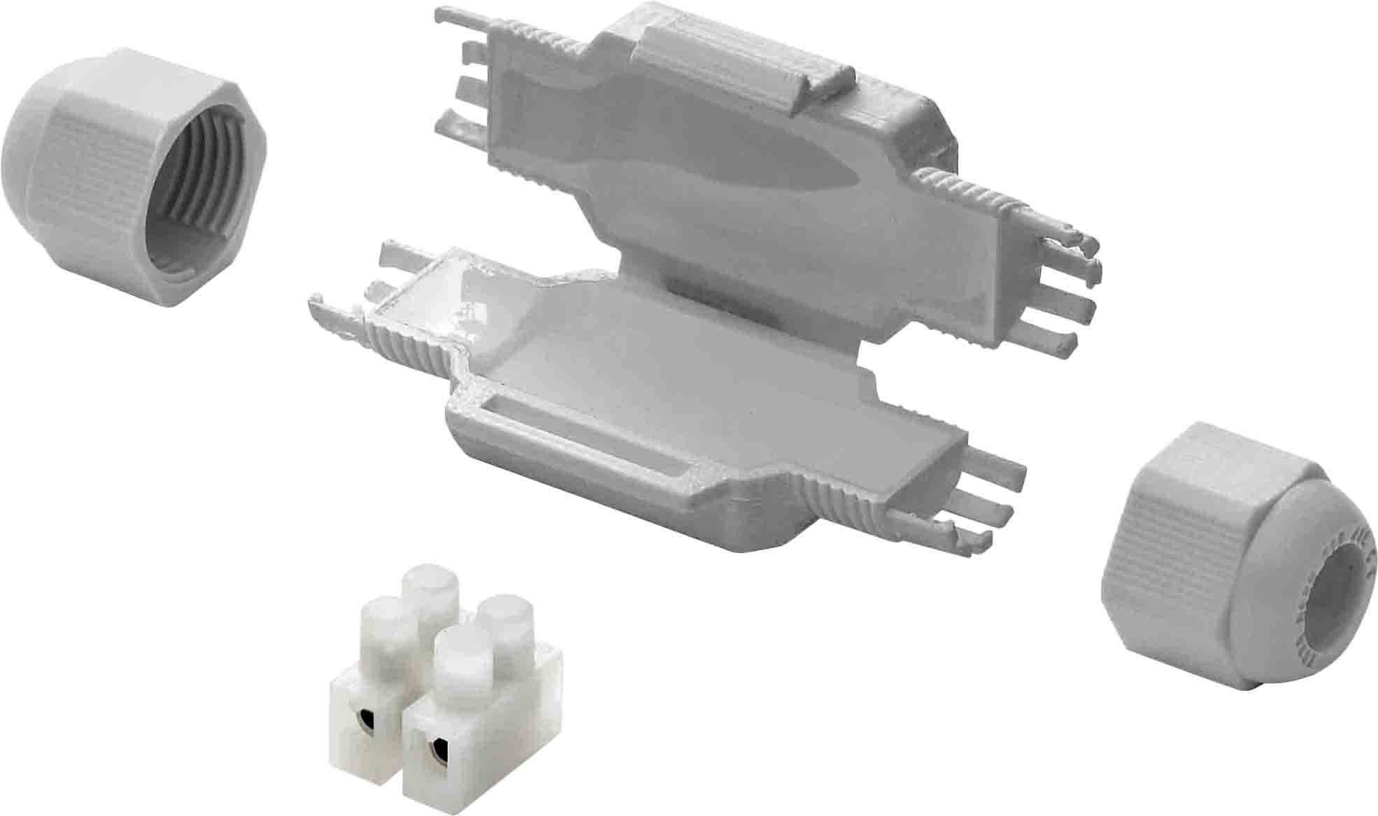 Grauer Kabelverbinder-Set mit offenem Gehäuse, zwei Verschlusskappen und dreipoligem Anschlussblock, zur elektrischen Verbindung.