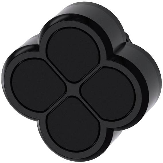 Ein schwarzes, vierblättriges Kleeblatt-förmiges Objekt mit glatter Oberfläche, möglicherweise eine dekorative oder funktionale Form.