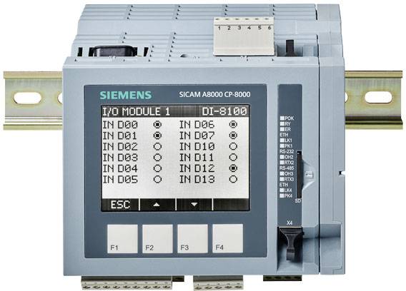 Industrie-Steuerungsmodul mit Textanzeige 'I/O Module 1 DT-8100'. Zeigt Eingänge IN D00 bis IN D13 und Verbindungssymbole.