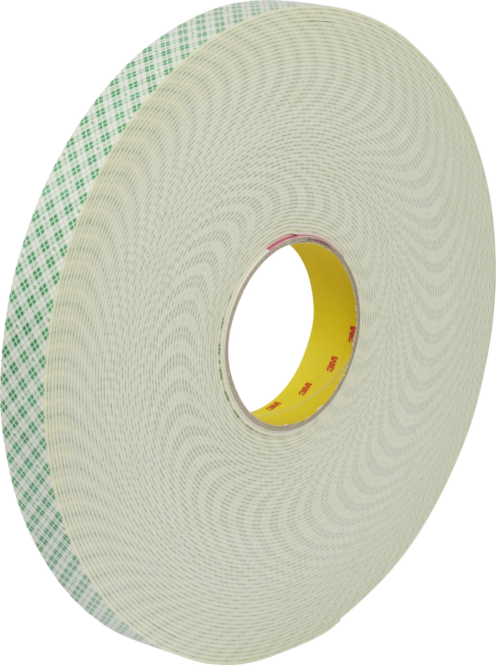Eine große Rolle doppelseitiges Klebeband mit einem grünen Muster auf der Außenseite und einem gelben Inneren.