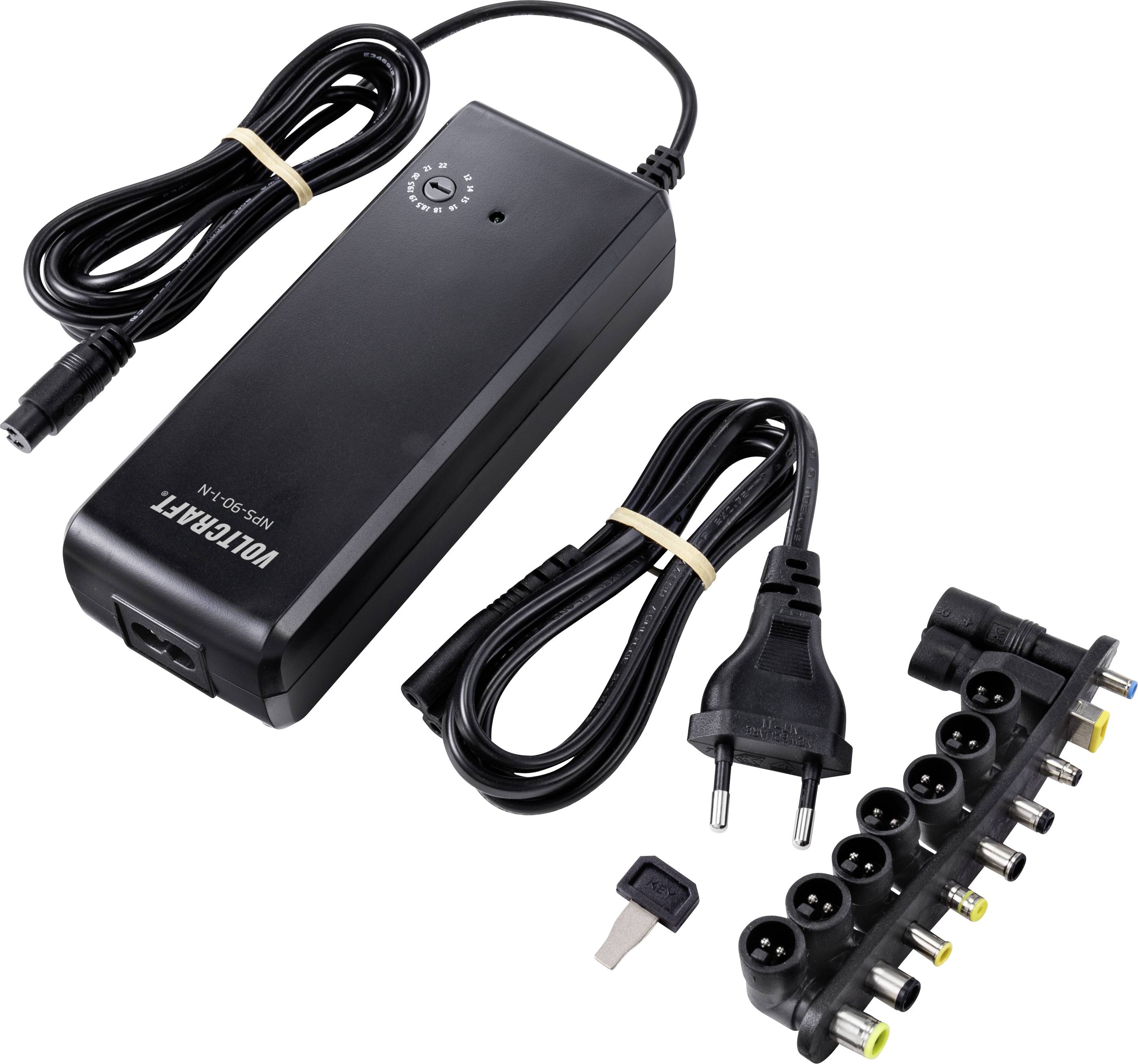 Schwarzes Netzteil mit mehreren austauschbaren Steckern zur Spannungsanpassung. Enthält EU-Stecker und einstellbaren Spannungsschalter.