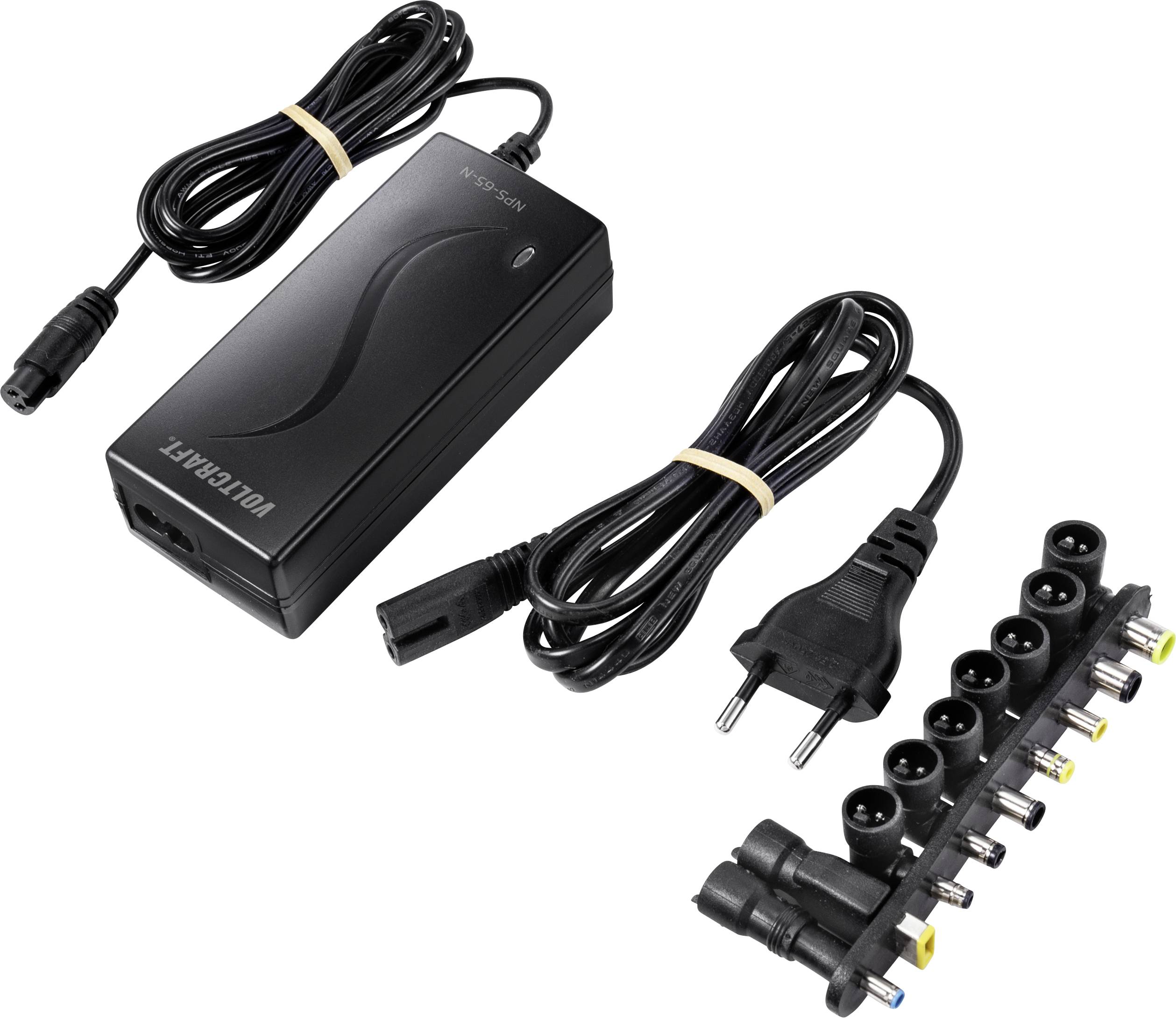 Schwarzes Universal-Laptop-Netzteil mit verschiedenen austauschbaren Anschlüssen und abnehmbarem Netzkabel.