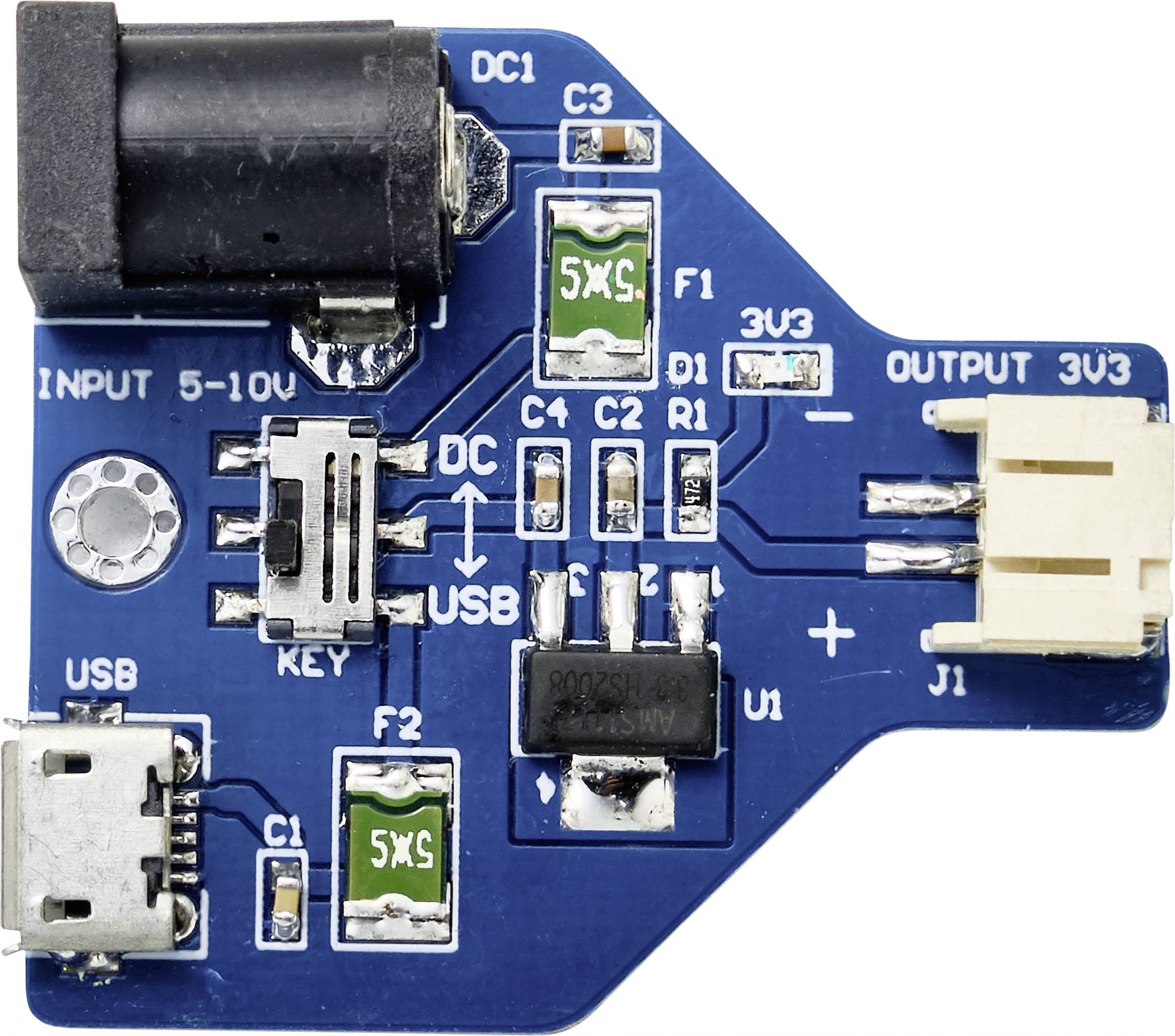 Eine blaue elektronische Schaltung mit mehreren weißen Anschlüssen, einem schwarzen Schalter und grünen Komponenten. Text 'INPUT 5-10V', 'OUTPUT 3V3'.
