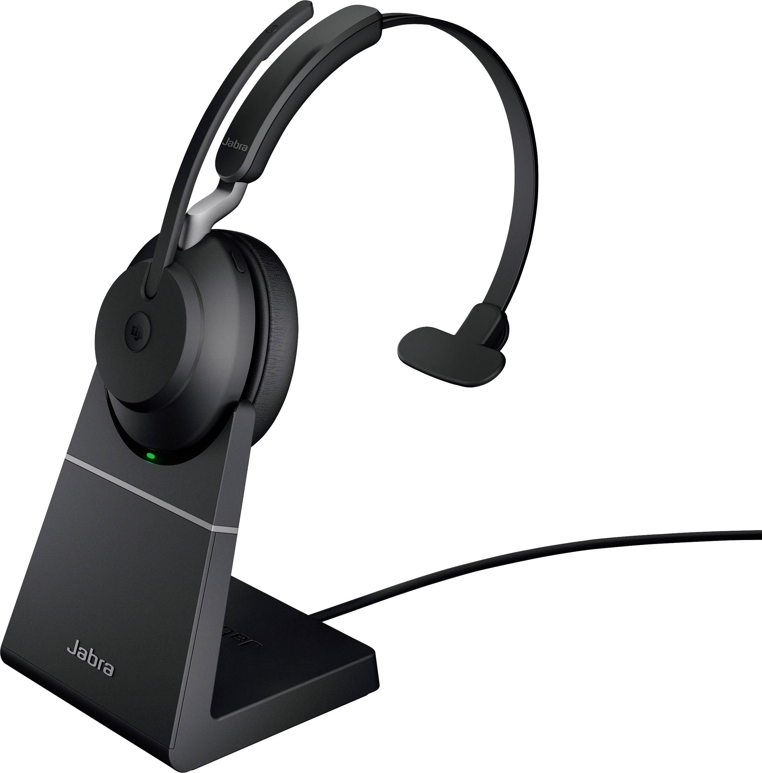 Headset mit Bügelmikrofon auf Ladestation. Kabelanschluss. Marke: Jabra.