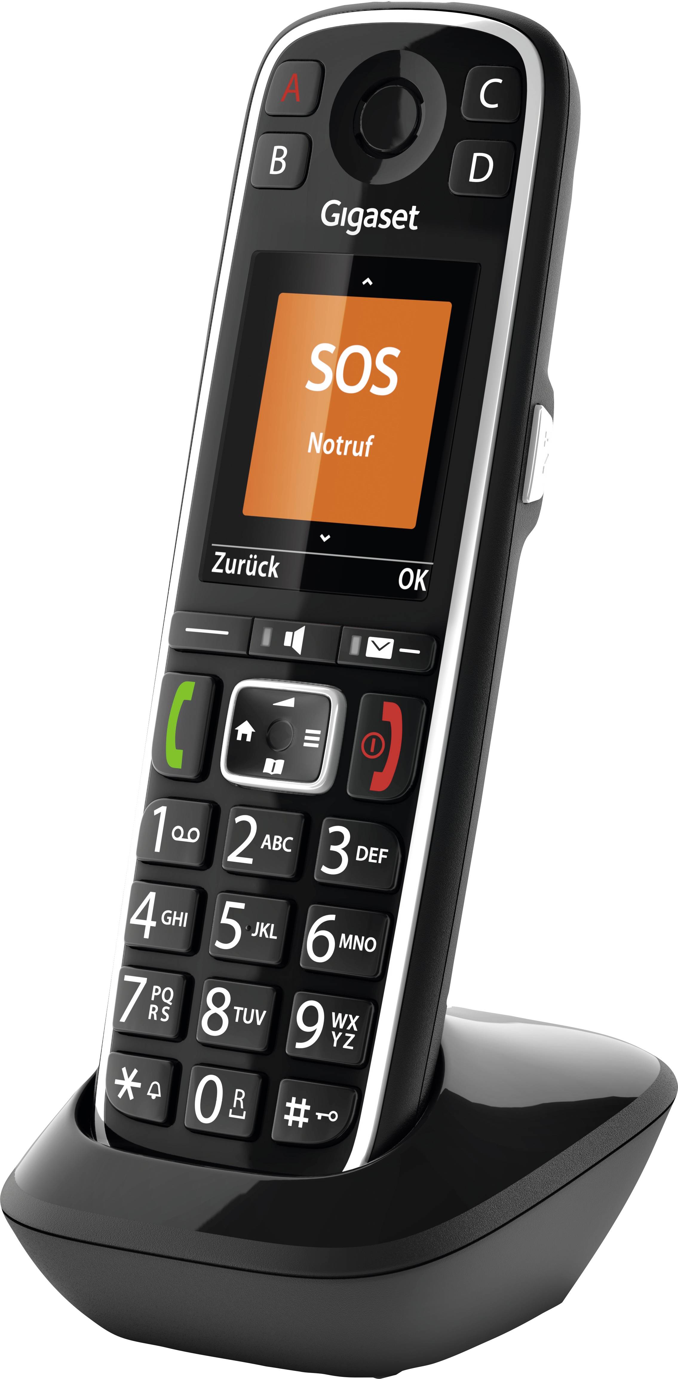 Schnurlostelefon mit großem Display zeigt 'SOS Notruf'. Tasten sind groß und klar. In Ladestation.