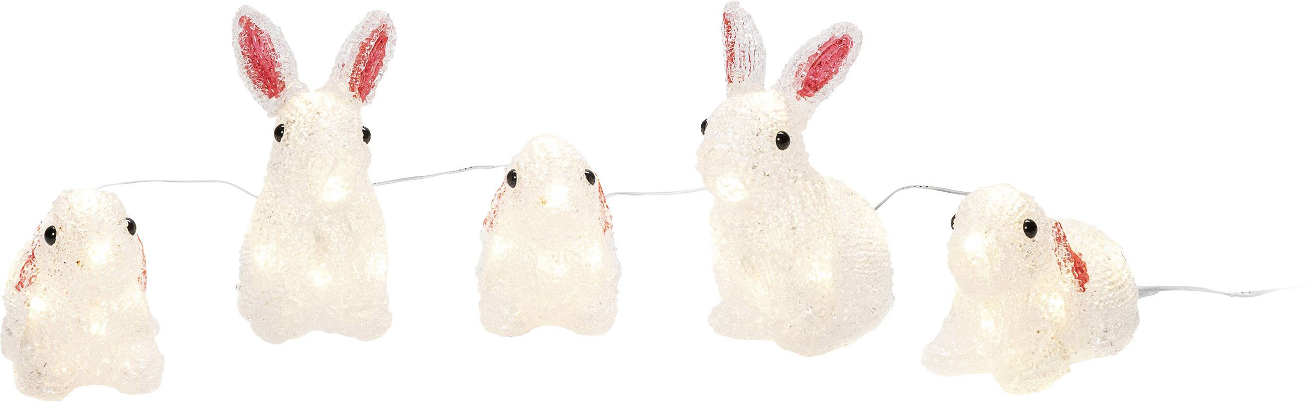 Weiße Hasen-Lichterkette mit fünf leuchtenden Hasenfiguren, rosa Ohren und schwarzen Augen. Dient als dekorative Beleuchtung.