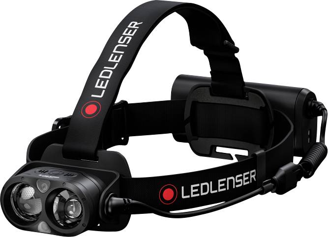 Stirnlampe mit zwei LED-Lichtern, verstellbarem Kopfband und schwarzem Batteriefach. Markenschriftzug 'LEDLENSER' auf dem Band.