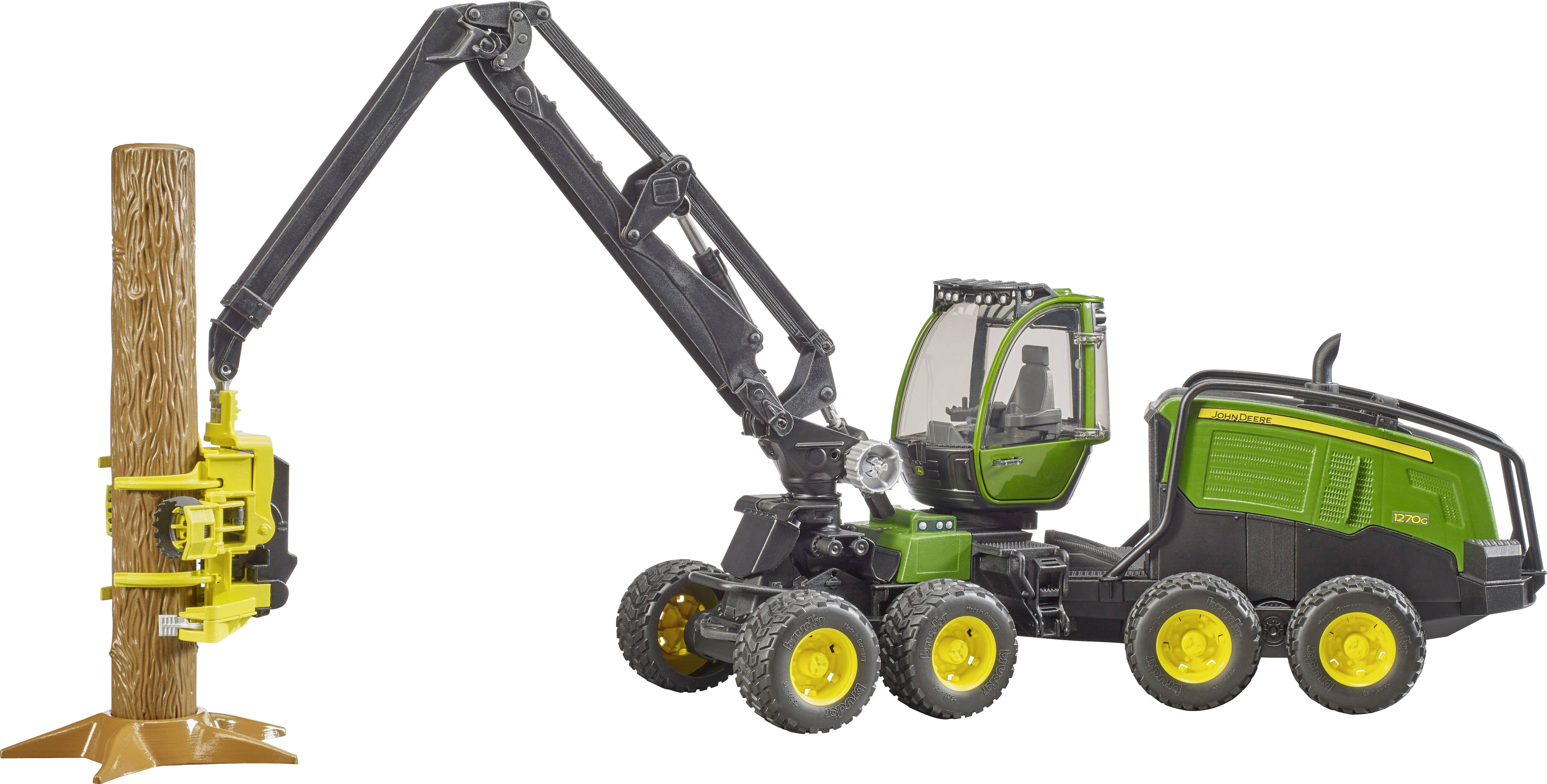 Ein Modell-Harvester mit sechs Rädern hebt einen Baumstamm auf. Der Harvester ist grün mit gelben Rädern und einem gelben Greifer.