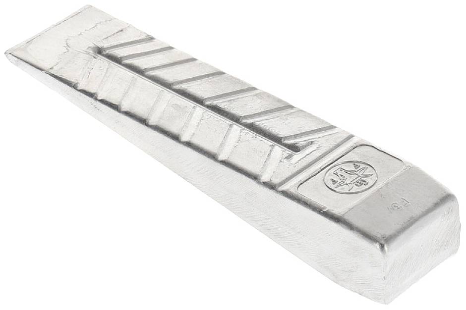 Ein silberner Metallkeil mit gerillter Oberseite und geprägtem Symbol.