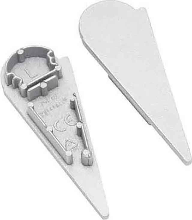 Zwei graue Kunststoffteile, die als Unterlegkeile für Bilderrahmen dienen. Links ist die Innenseite mit aufgedruckten Zeichen zu sehen.