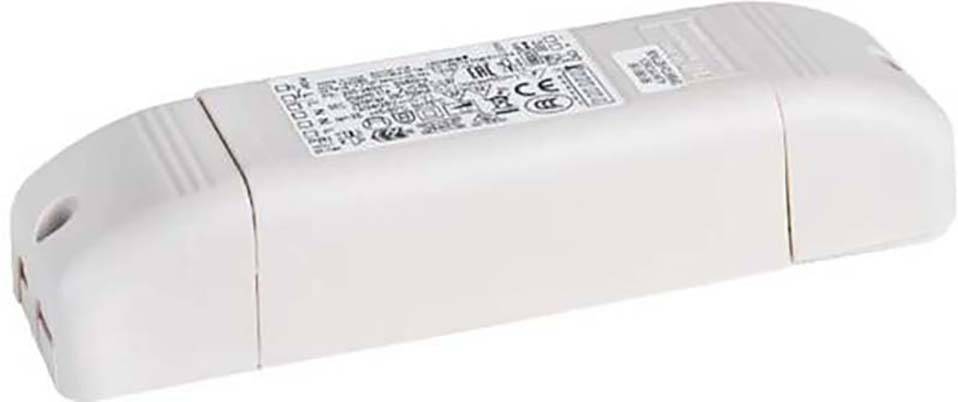 Ein rechteckiges, weißes elektrisches Bauteil mit Text und Symbolen oben. Es hat abgerundete Ecken und Anschlüsse auf einer Seite.