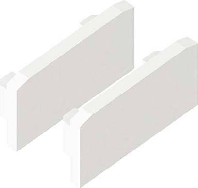 Zwei weiße rechteckige Blöcke mit kleinen, abgerundeten Vorsprüngen auf den Längsseiten, die parallel und leicht zueinander versetzt sind.