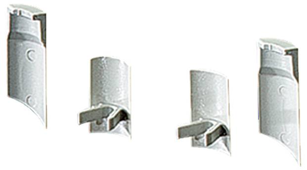 Vier graue, zylindrische Gegenstände, wahrscheinlich Maschinenkomponenten, in verschiedenen Ansichten angeordnet.