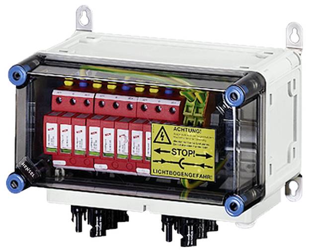 Ein elektrisches Gerät in einem Gehäuse mit mehreren roten Schaltern und gelbem Warnschild: 'Achtung! Stop! Lichtbogengefahr'.