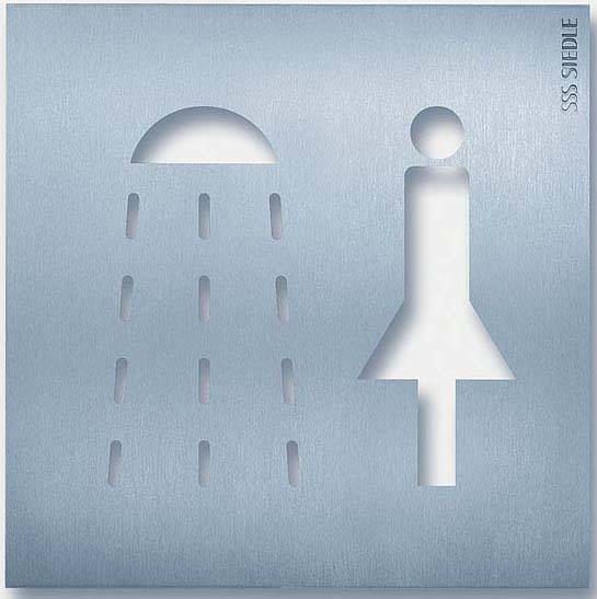 Piktogramm einer Dusche und einer stilisierten Person auf einer Metallplatte, symbolisiert eine Frauen-Dusche.