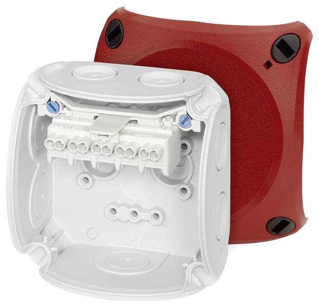 Roter und weißer elektrischer Verteilerkasten, geöffnet und gezeigt mit Anschlussklemmen, geeignet für Wandmontage.