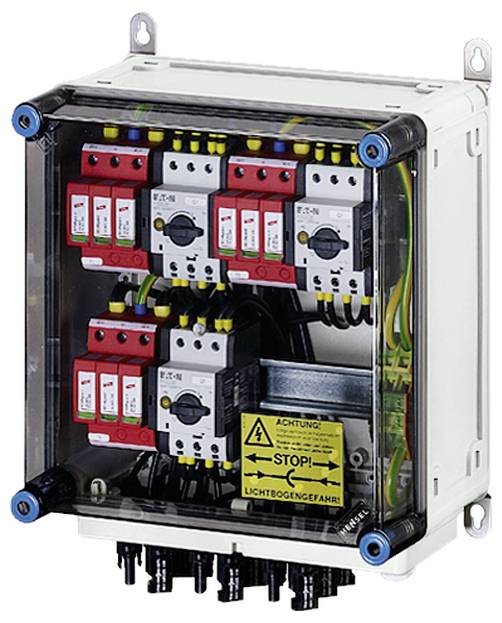 Elektrischer Schaltkasten mit mehreren rot und schwarz gekennzeichneten Schaltern. Gelbes Warnschild: 'Achtung! Lichtbogengefahr'.