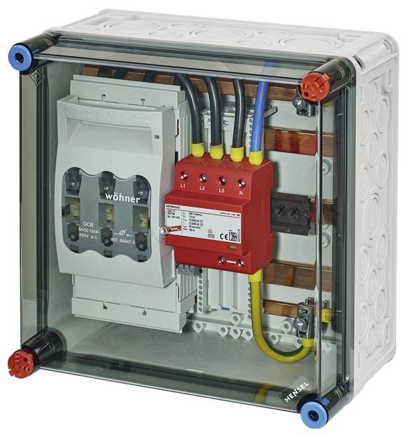 Elektrischer Schaltkasten mit transparentem Gehäuse. Sichtbare Komponenten: Sicherungen und Verkabelung, markiert nach L1, L2, L3 Phasen.