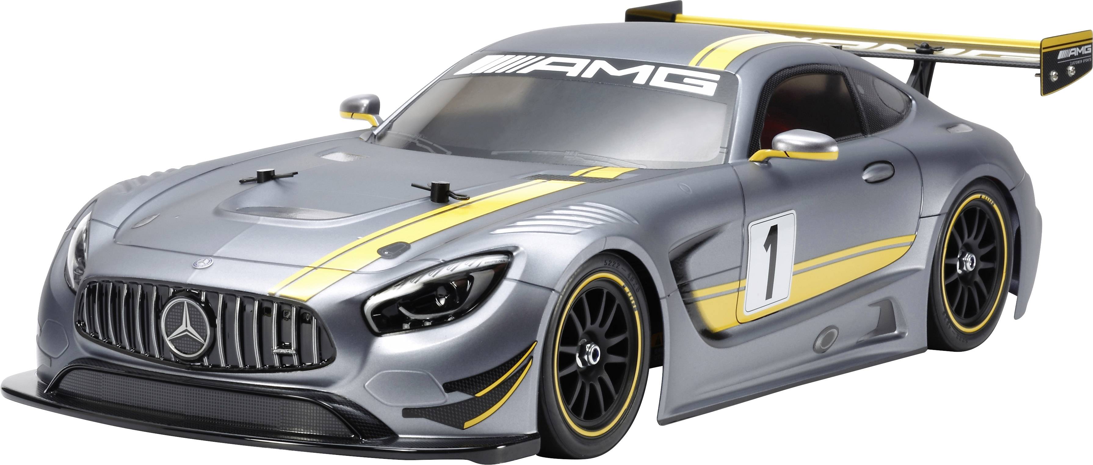 Graues Modellauto eines Sportwagens mit AMG-Logo, Nummer '1', gelben Streifen und großem Heckspoiler.