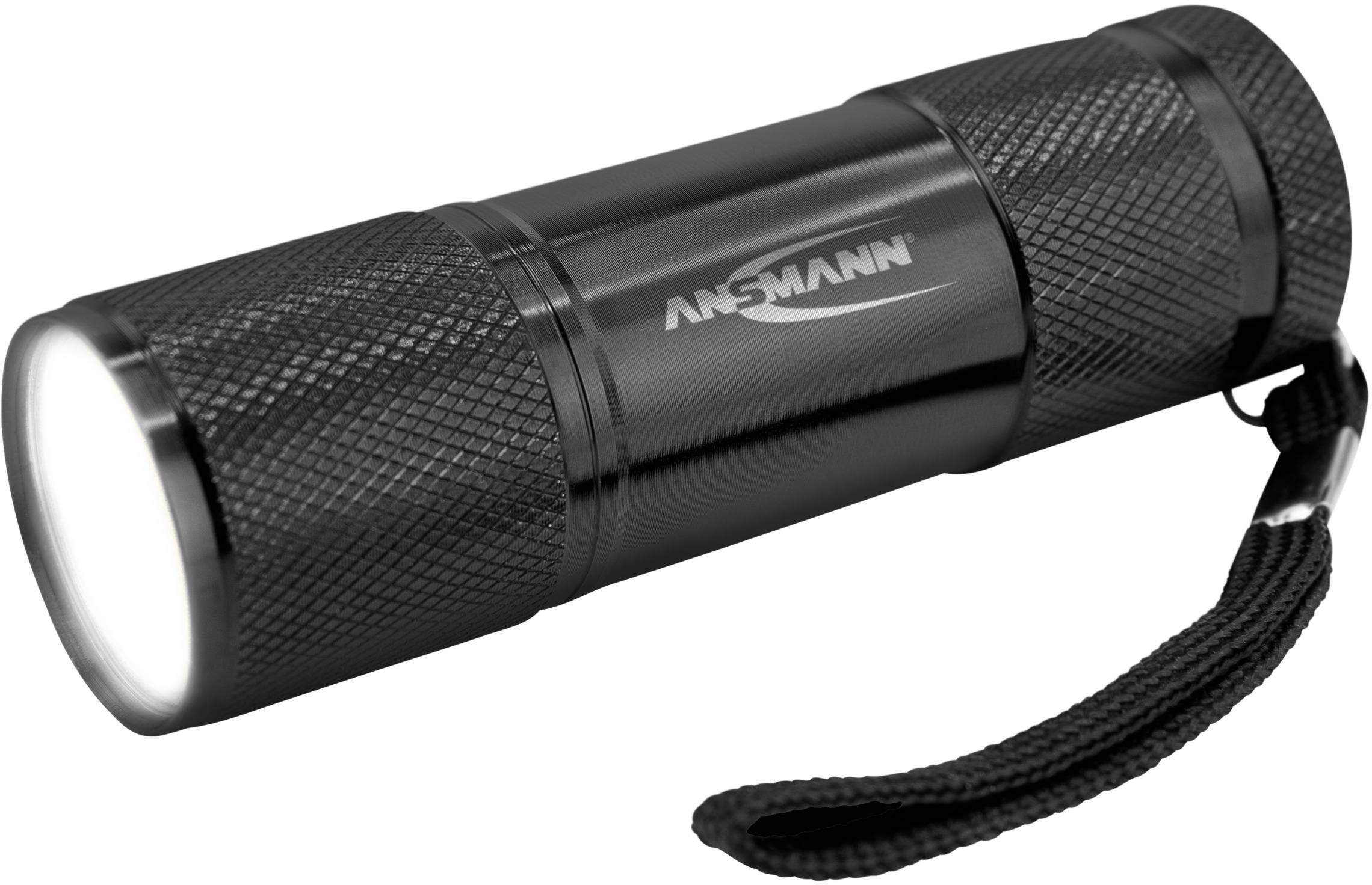 Eine schwarze, kompakte Taschenlampe mit strukturiertem Griff und Trageschlaufe wird angezeigt.