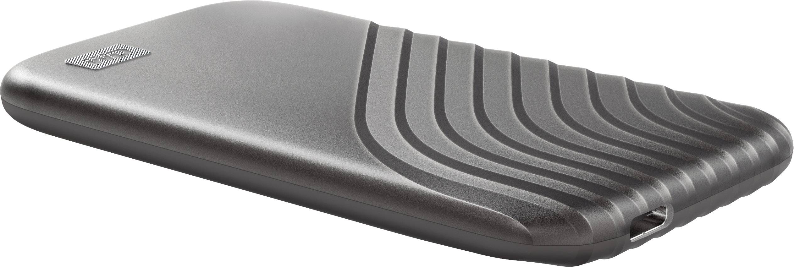 Eine graue externe Festplatte mit einem wellenförmigen Design auf der Oberfläche, USB-Anschluss sichtbar an der Vorderseite.