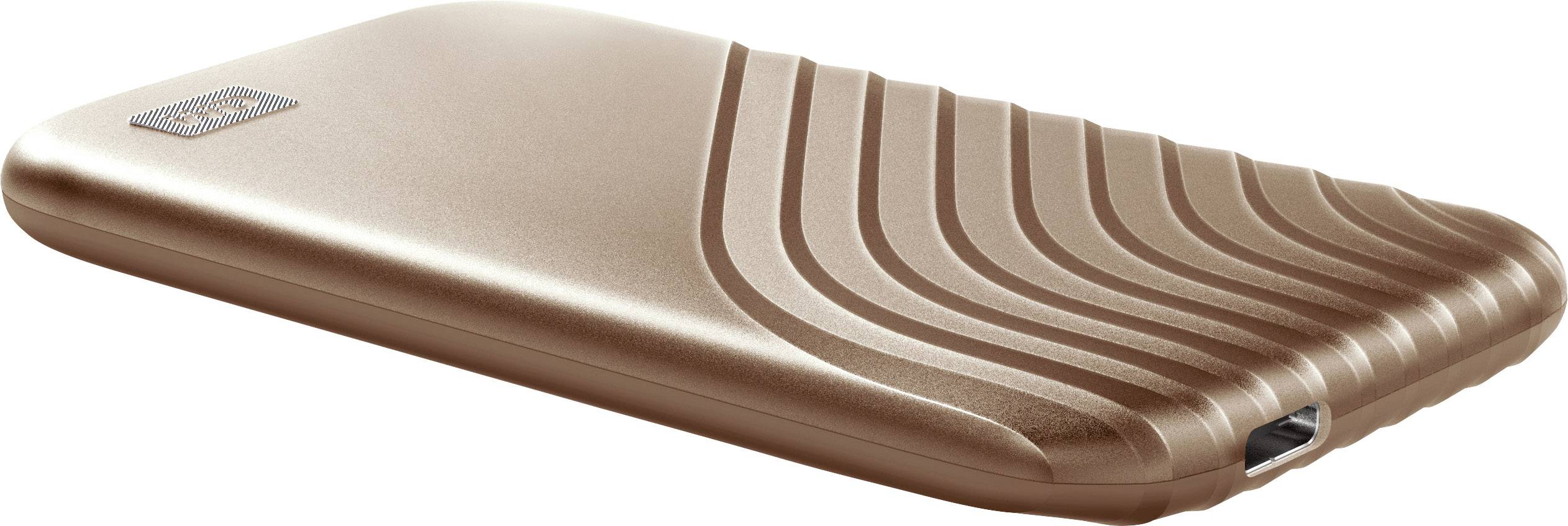 Eine bronzefarbene externe Festplatte mit geripptem Design und USB-Anschluss auf der Vorderseite.