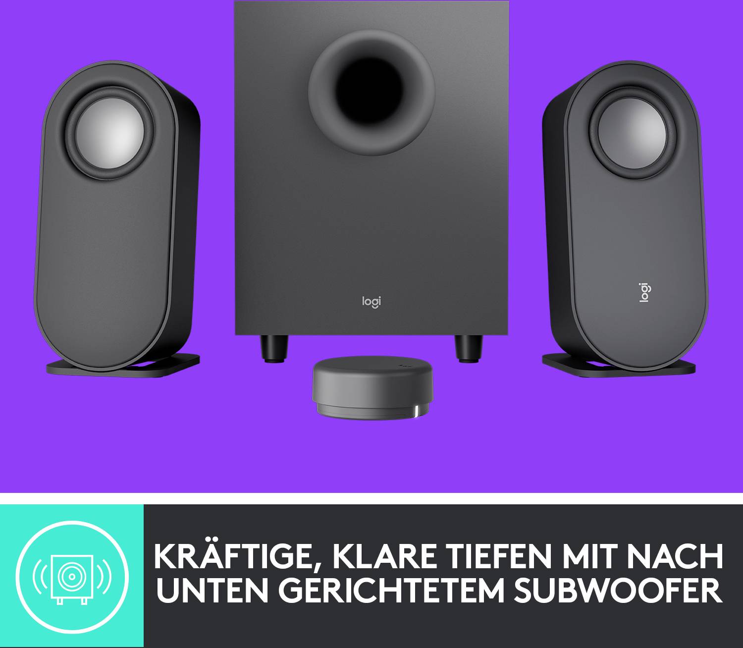 Schwarze Lautsprecher mit Subwoofer und kleinem Steuergerät, Produktwerbung für klare Tieftöne. Text: 'Kräftige, klare Tiefen mit nach unten gerichtetem Subwoofer'.