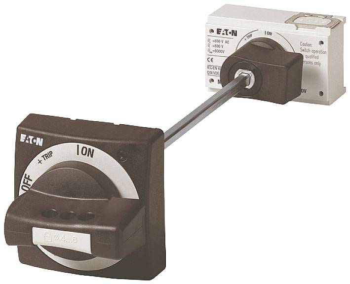 Ein brauner Lasttrennschalter mit 'ON', 'OFF', '+ TRIP' Beschriftungen, hergestellt von Eaton, verbunden durch einen Metallstab.