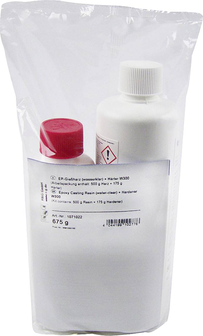 Zwei Flaschen in transparenter Verpackung; rote und weiße Verschlüsse. Etikett mit chemischen Warnhinweisen und Produktinformationen.