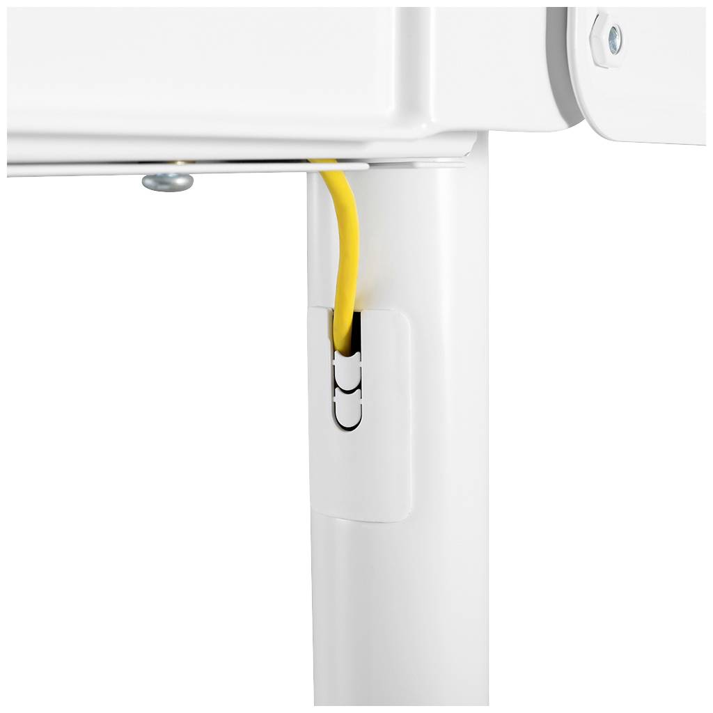 Ein gelbes Kabel ist in ein weißes Rohr eingeführt, das von einem Möbelstück oder Gerät herabhängt, gesichert durch eine Klemme.