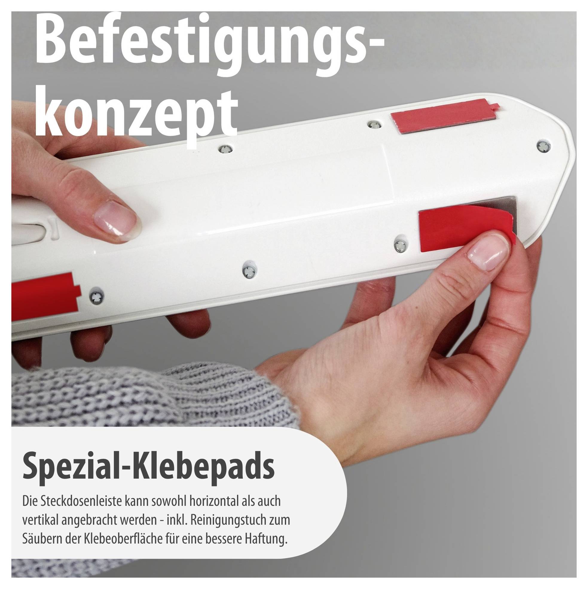 Hand befestigt eine Steckdosenleiste mit roten Spezial-Klebepads; Text nennt das Befestigungskonzept und die Montage horizontal oder vertikal.