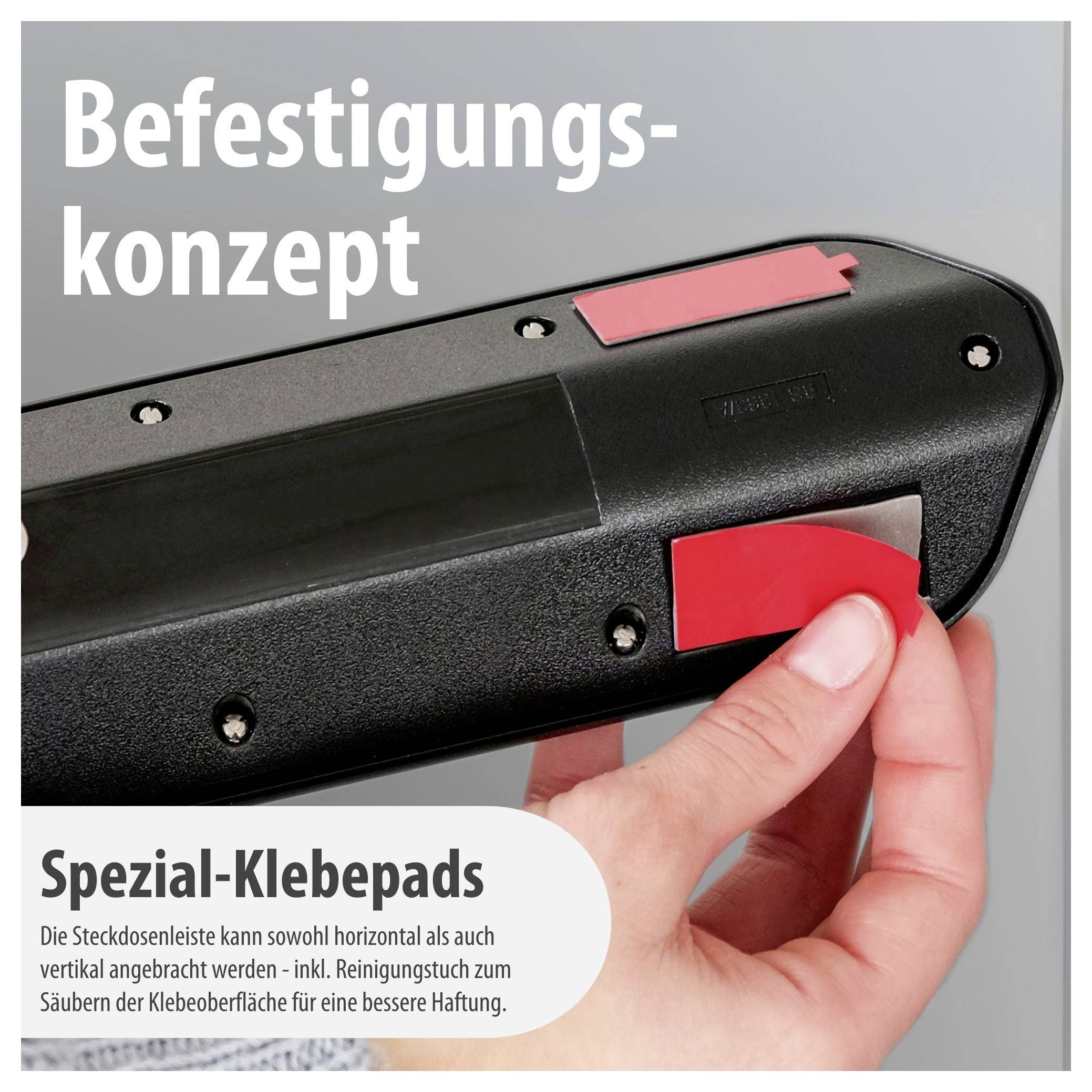 Werbung für Befestigungskonzept: Hand befestigt Steckdosenleiste mit Spezial-Klebepads; Text nennt horizontale oder vertikale Montage und Reinigungstuch für bessere Haftung.