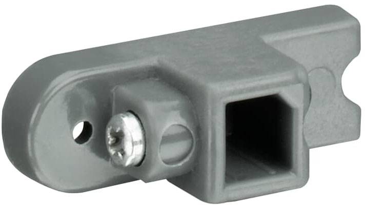 Graues Plastik-Gegenstand mit quadratischer Aussparung und Metallbolzen, möglicherweise ein Verbindungselement oder eine Halterung.