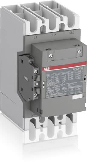 Schütz mit grauem Gehäuse und roten Akzenten, beschriftet mit technischen Details. Er wird in elektrischen Schaltanlagen verwendet.