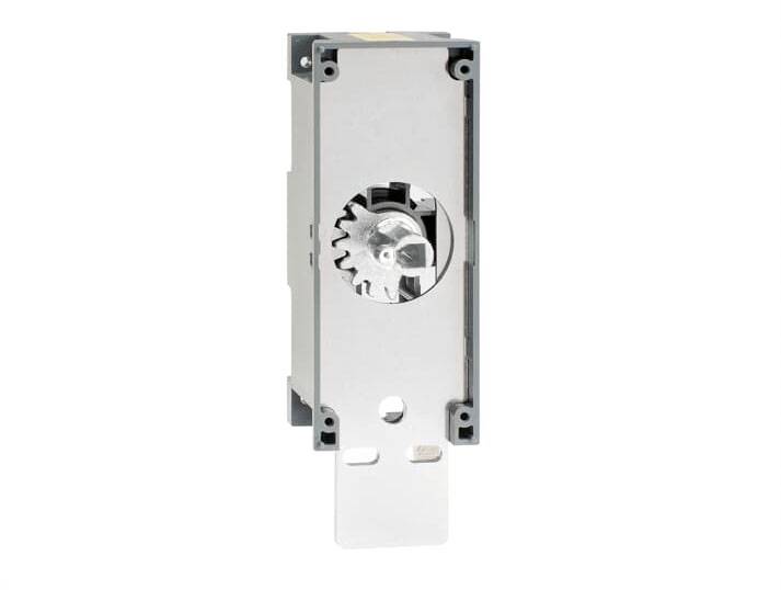 Metallgetriebe in rechteckiger Halterung mit sichtbaren Zahnrädern. Geeignet für mechanische Anwendungen oder Ersatzteile.
