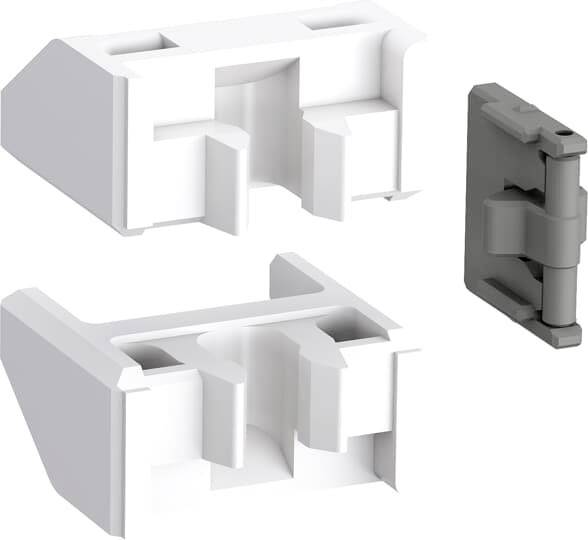 Weiße und graue Kunststoffteile eines modularen Verriegelungssystems.