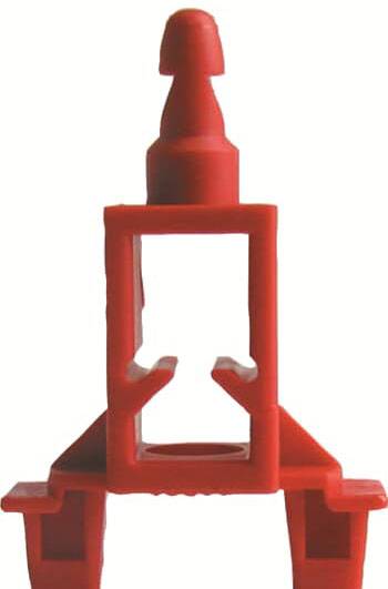 Roter Kunststoffeinsatz in Form eines offenen Rechtecks mit aufgesetztem zylindrischen Element, möglicherweise ein Bauteil oder Werkzeug.