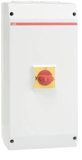 Ein elektrischer Schaltschrank mit einem roten Drehschalter auf gelbem Hintergrund in der Mitte, verwendet zur Steuerung und Sicherheit.