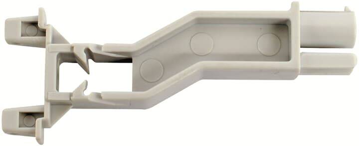 Graues Kunststoffteil, möglicherweise ein Verbindungs- oder Befestigungselement mit mehreren Aussparungen und Befestigungspunkten.