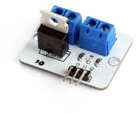 Ein MOSFET-Modul mit zwei blauen Anschlussklemmen und drei PINs auf einer Kunststoffwiederstände-Montageplatte.