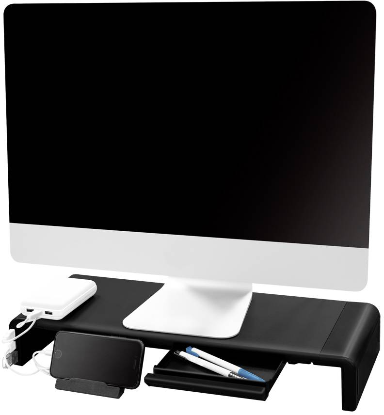 Ein Computerbildschirm auf einem schwarzen Monitorständer mit Ladegeräten, einem Handy und Stiften darunter.