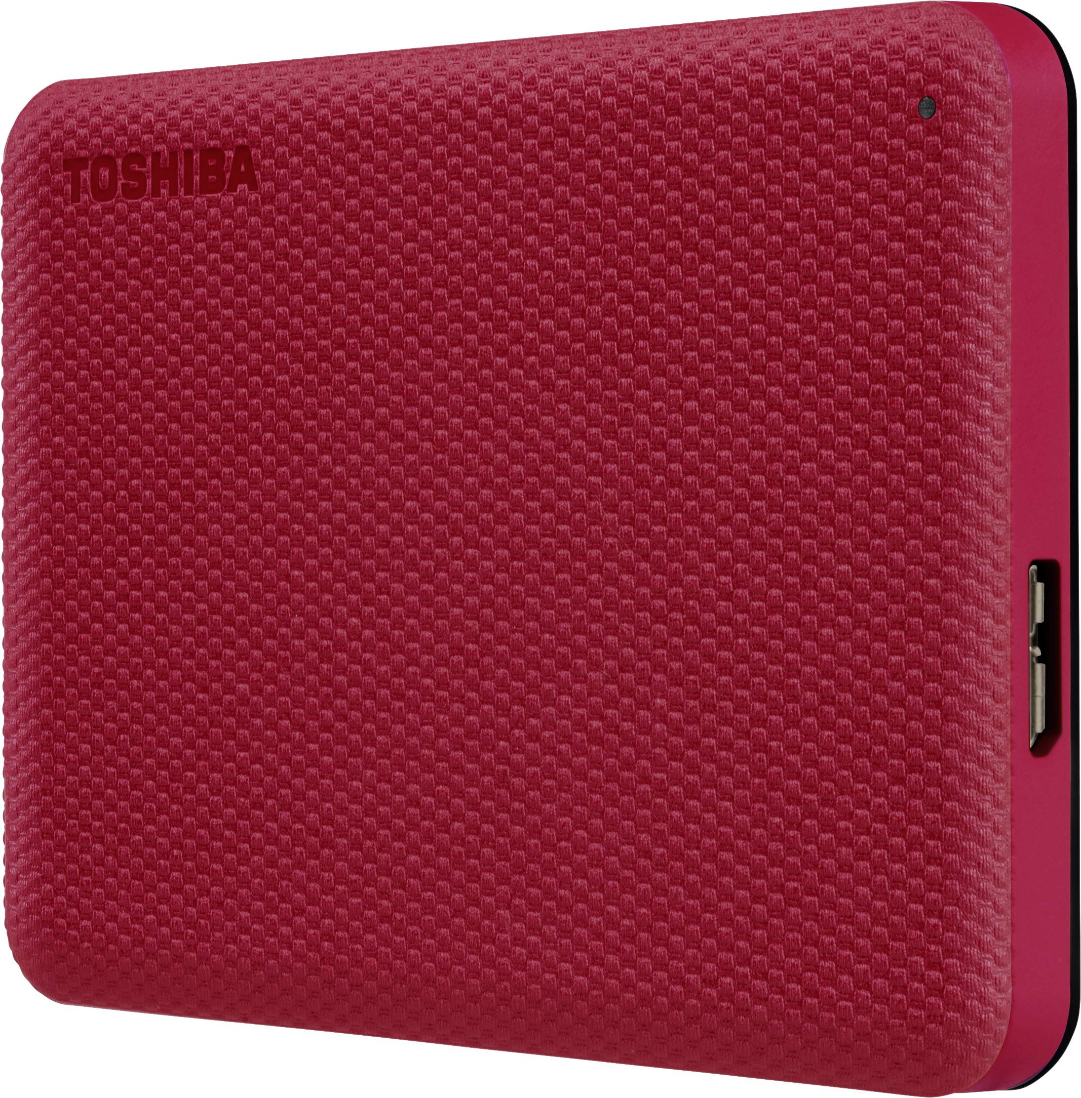 Externe rote Festplatte von Toshiba mit strukturiertem Gehäuse, USB-Anschluss sichtbar.