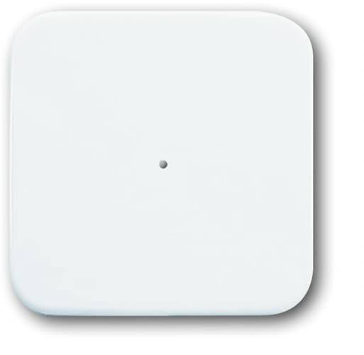 Ein weißer, quadratischer, flacher Schalter mit einem kleinen Punkt in der Mitte.