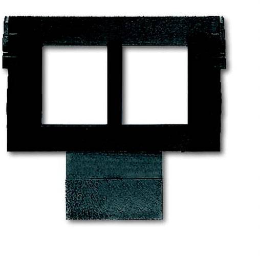 Ein stilisierter, schwarzer Umriss, der ein Gesicht mit Brille darstellt.