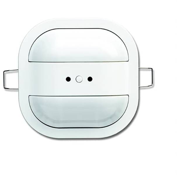 Ein weißes, quadratisches Gerät mit abgerundeten Ecken und zwei seitlichen Griffen. In der Mitte befinden sich zwei kleine Löcher.