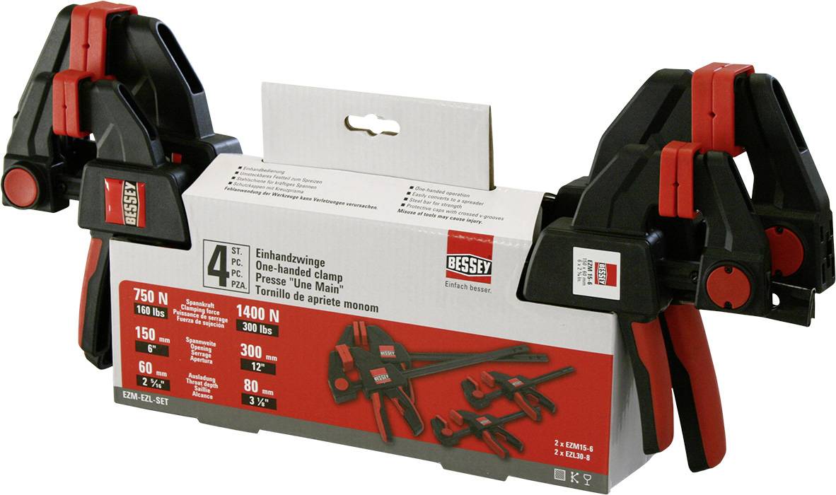 'BESSEY' Einhandzwingen-Set in Originalverpackung, bestehend aus zwei roten und schwarzen Zwingen zum Festspannen von Werkstücken.