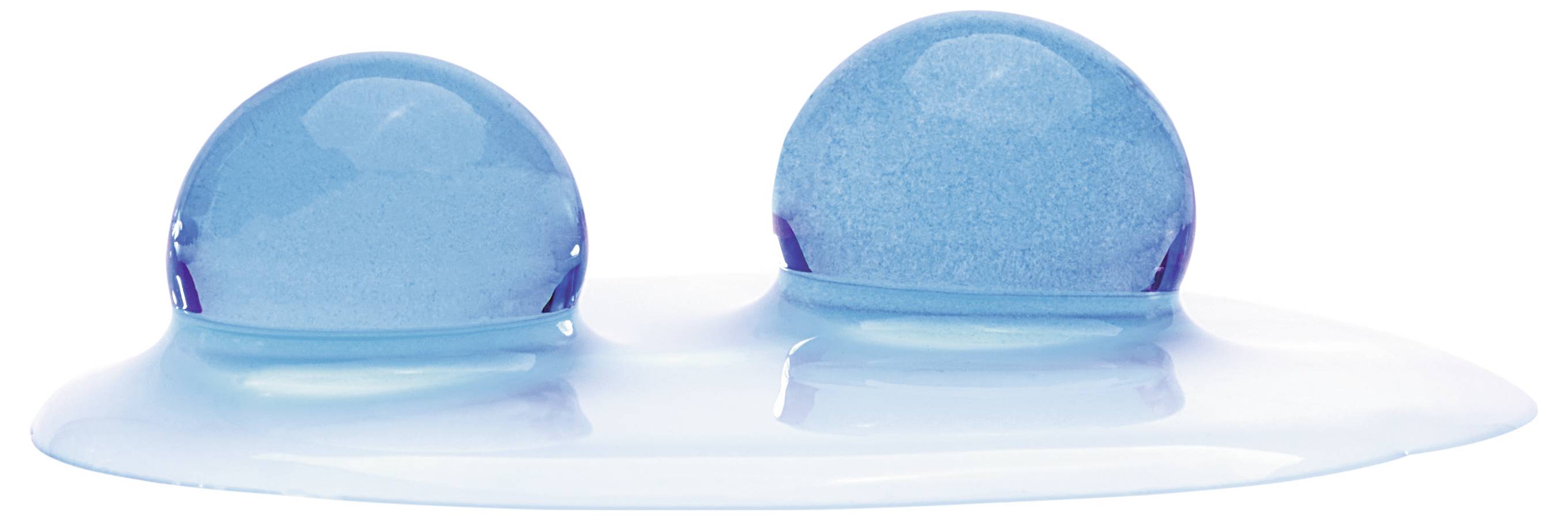 Zwei blaue, gelförmige Tropfen ruhen auf einer glatten Oberfläche und reflektieren das Licht. Die Tropfen haben unterschiedliche Größen und deuten auf Fluidität und Oberflächenspannung hin.