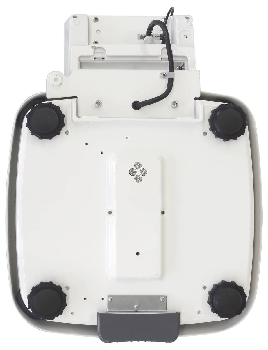 Eine weiße Vorrichtung mit schwarzem Kabel und vier schwarzen Knöpfen, möglicherweise ein Teil eines technischen Geräts oder einer Maschine.